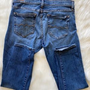 Red engine skinny crop jeans